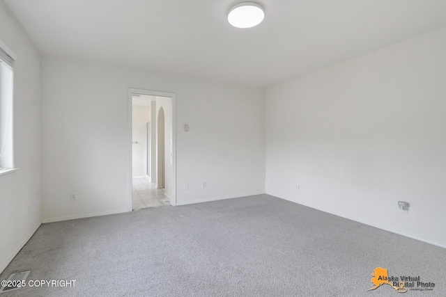 2321 Lusardi Point Cir, Anchorage, AK 99515 - spare room featuring carpet floors and baseboards