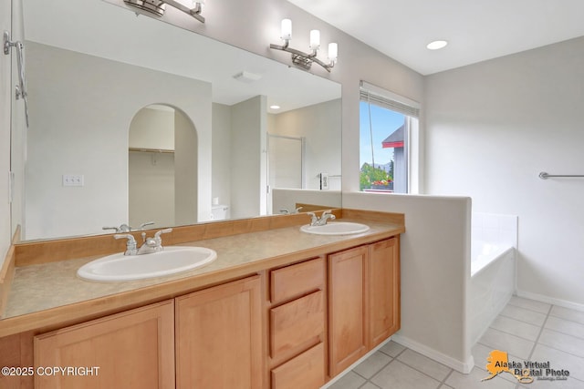 2321 Lusardi Point Cir, Anchorage, AK 99515 - bathroom with a bath, tile patterned flooring, double vanity, and a shower