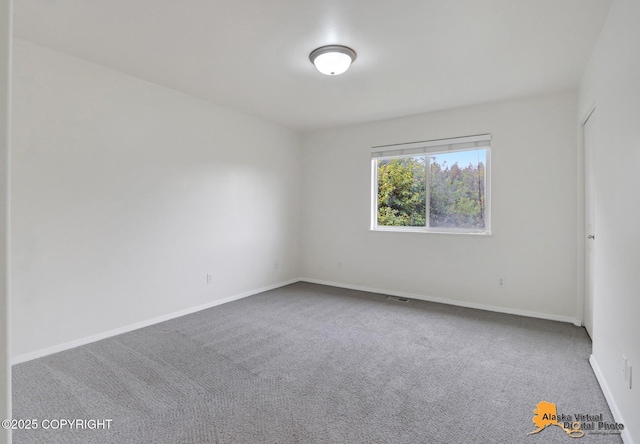 2321 Lusardi Point Cir, Anchorage, AK 99515 - carpeted empty room featuring baseboards