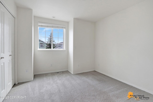 2321 Lusardi Point Cir, Anchorage, AK 99515 - unfurnished bedroom with carpet and baseboards
