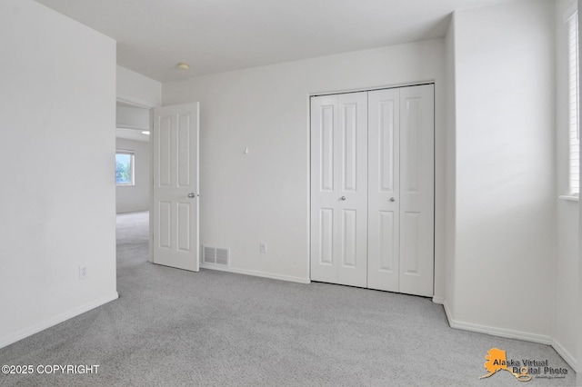 2321 Lusardi Point Cir, Anchorage, AK 99515 - unfurnished bedroom with carpet and a closet