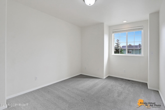 2321 Lusardi Point Cir, Anchorage, AK 99515 - carpeted spare room with baseboards