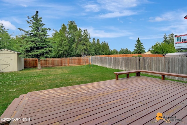 2321 Lusardi Point Cir, Anchorage, AK 99515 - deck featuring a fenced backyard and a storage unit
