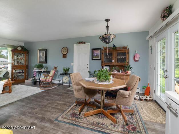 282 Marydale Ct, Soldotna, AK 99669 - dining space with healthy amount of natural light and wood finished floors