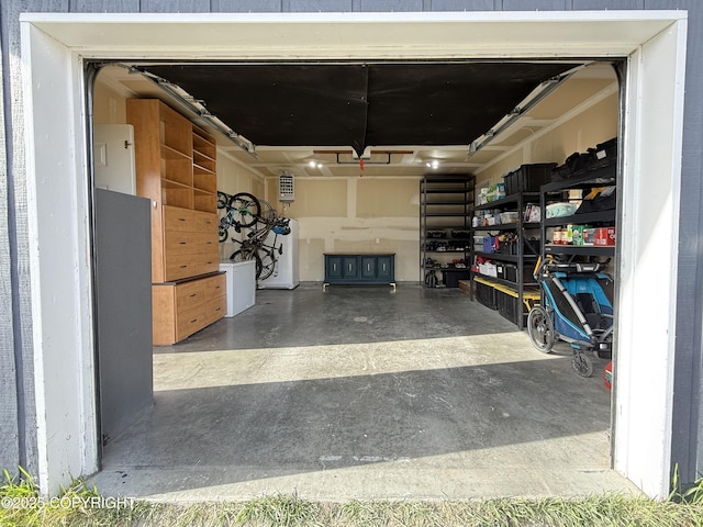 14795 E Hearthstone Dr, Palmer, AK 99645 - garage featuring fridge