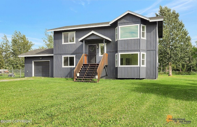 14795 E Hearthstone Dr, Palmer, AK 99645 - view of front of house with a front lawn and a garage