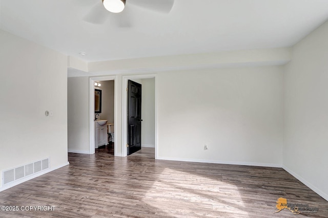 14795 E Hearthstone Dr, Palmer, AK 99645 - empty room with a ceiling fan and wood finished floors