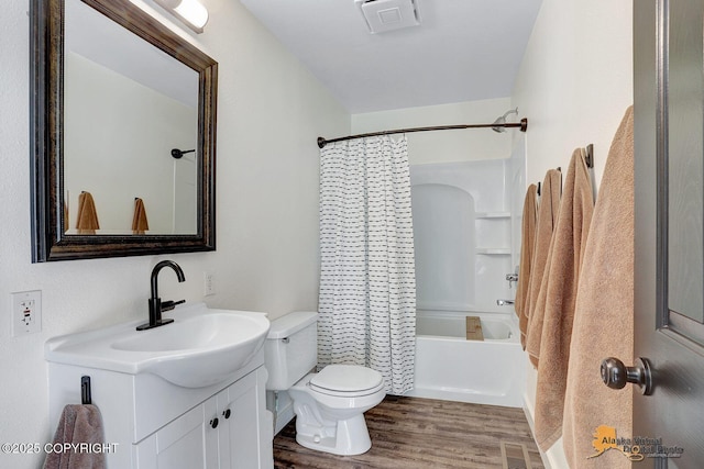 14795 E Hearthstone Dr, Palmer, AK 99645 - full bathroom featuring vanity, wood finished floors, and shower / tub combo