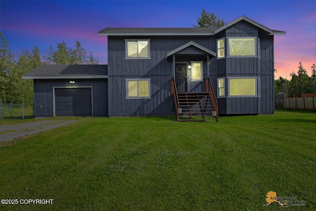 14795 E Hearthstone Dr, Palmer, AK 99645 - view of front facade with driveway, an attached garage, and roof with shingles