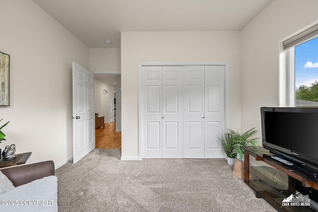 23011 Sherman St # 24, Chugiak, AK 99567 - carpeted bedroom with a closet and baseboards