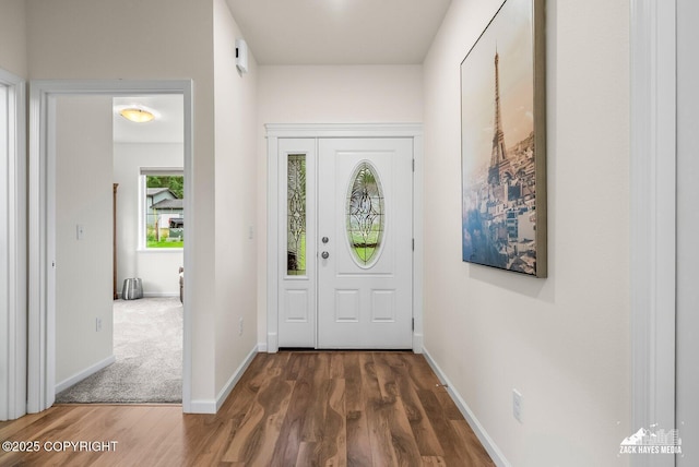 23011 Sherman St # 24, Chugiak, AK 99567 - foyer entrance featuring wood finished floors and baseboards