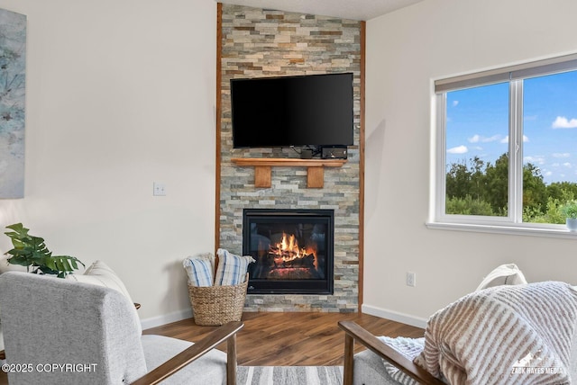 23011 Sherman St # 24, Chugiak, AK 99567 - living room with a stone fireplace and wood finished floors