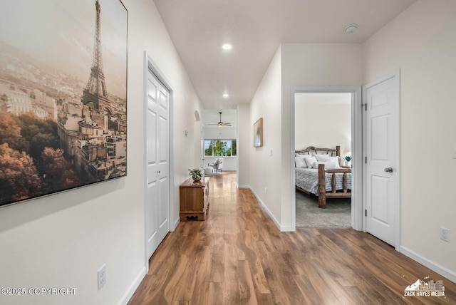 23011 Sherman St # 24, Chugiak, AK 99567 - hallway featuring wood finished floors and recessed lighting
