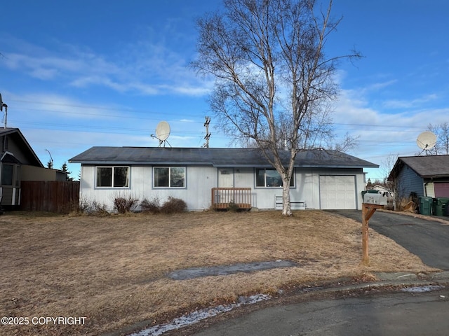 2541 Lyvona Ln, Anchorage, AK 99502 - single story home featuring asphalt driveway and a garage
