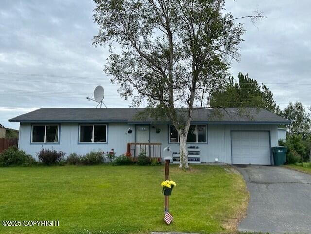 2541 Lyvona Ln, Anchorage, AK 99502 - ranch-style house with a garage, driveway, and a front lawn