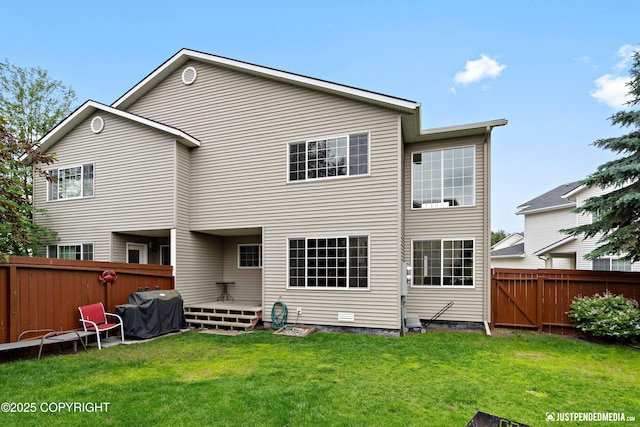 2431 Harbor Landing Cir, Anchorage, AK 99515 - rear view of house featuring a fenced backyard and a wooden deck