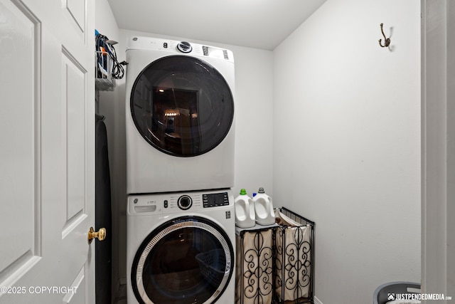 2431 Harbor Landing Cir, Anchorage, AK 99515 - laundry area featuring stacked washer / dryer