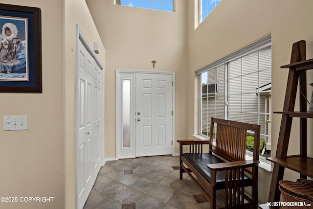 2431 Harbor Landing Cir, Anchorage, AK 99515 - entryway featuring a towering ceiling