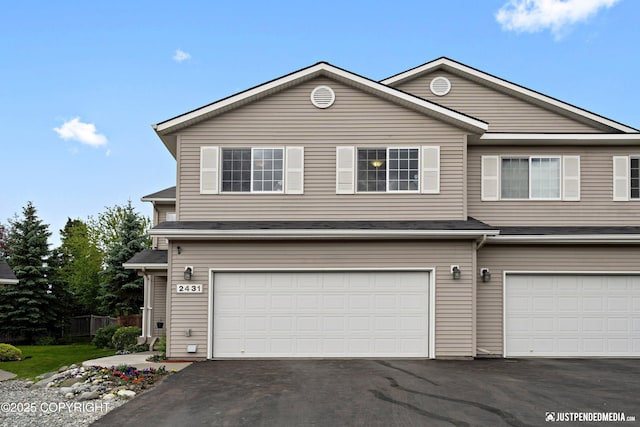 2431 Harbor Landing Cir, Anchorage, AK 99515 - traditional-style home with a garage and driveway