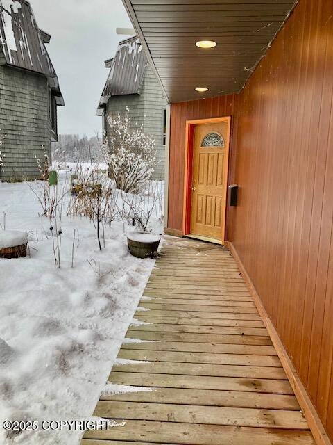 1854 Buccaneer Pl, Anchorage, AK 99501 - view of snow covered property entrance