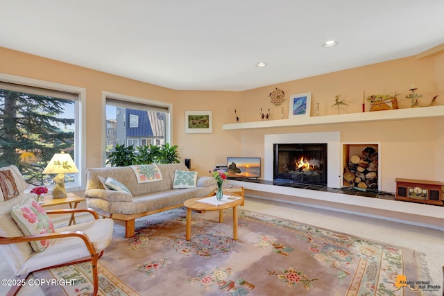 1854 Buccaneer Pl, Anchorage, AK 99501 - living room featuring a warm lit fireplace and recessed lighting