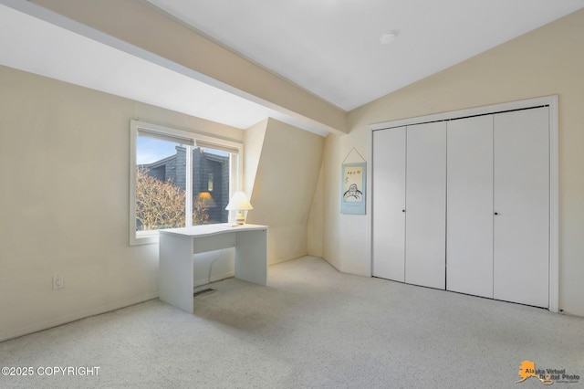 1854 Buccaneer Pl, Anchorage, AK 99501 - unfurnished bedroom featuring vaulted ceiling and a closet