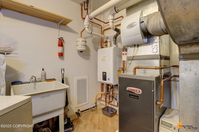 1854 Buccaneer Pl, Anchorage, AK 99501 - utilities featuring water heater