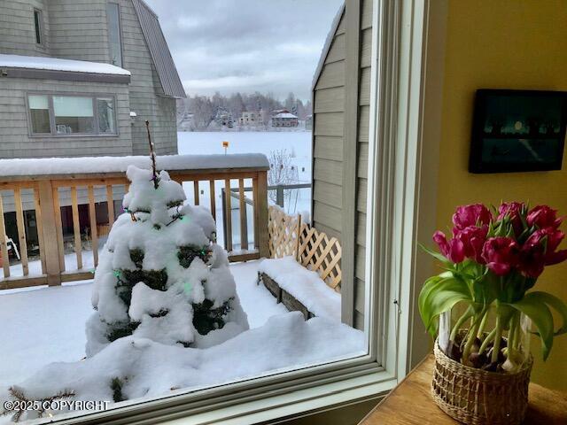 1854 Buccaneer Pl, Anchorage, AK 99501 - view of snow covered back of property