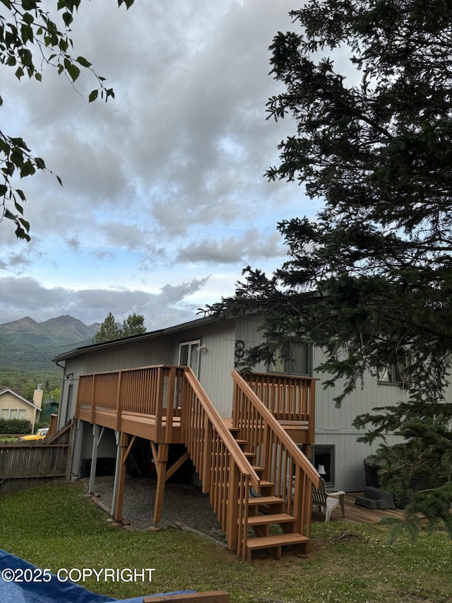 1900 Rebel Ridge Dr, Anchorage, AK 99504 - rear view of property with stairs and a deck with mountain view