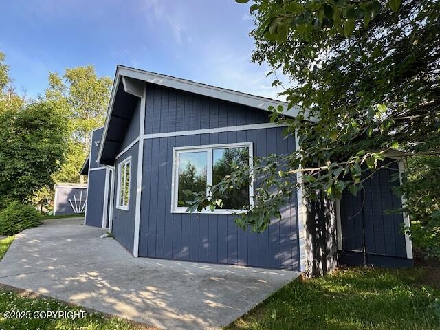 950 E Chugach View Dr, Wasilla, AK 99654 - view of property exterior with a patio area
