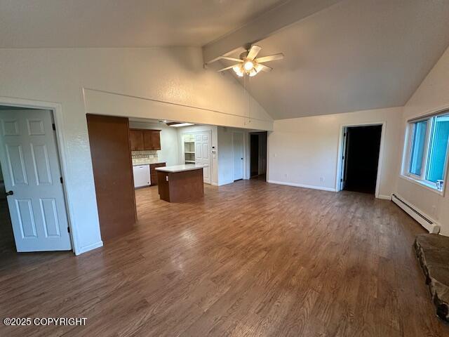 950 E Chugach View Dr, Wasilla, AK 99654 - unfurnished living room featuring a baseboard heating unit, a ceiling fan, beamed ceiling, dark wood-style flooring, and high vaulted ceiling