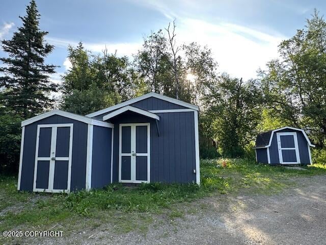 950 E Chugach View Dr, Wasilla, AK 99654 - view of shed with view of wooded area