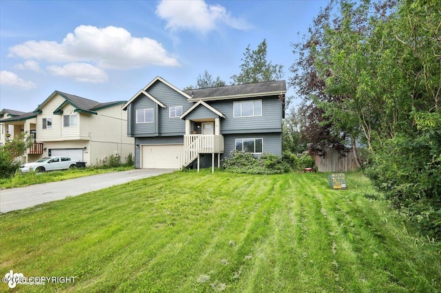 1250 W Josselin Ln, Palmer, AK 99645 - raised ranch featuring driveway, an attached garage, and a front yard