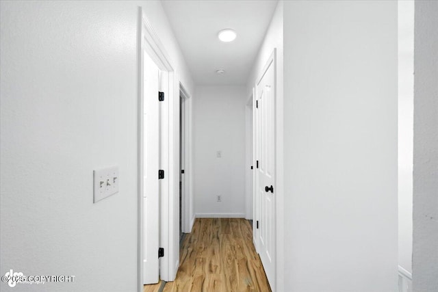 1250 W Josselin Ln, Palmer, AK 99645 - hallway featuring light wood-style floors and baseboards
