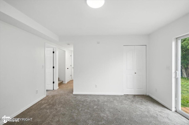 1250 W Josselin Ln, Palmer, AK 99645 - unfurnished bedroom with carpet, access to exterior, and a closet