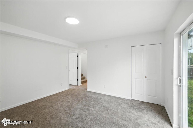1250 W Josselin Ln, Palmer, AK 99645 - unfurnished bedroom featuring carpet and a closet