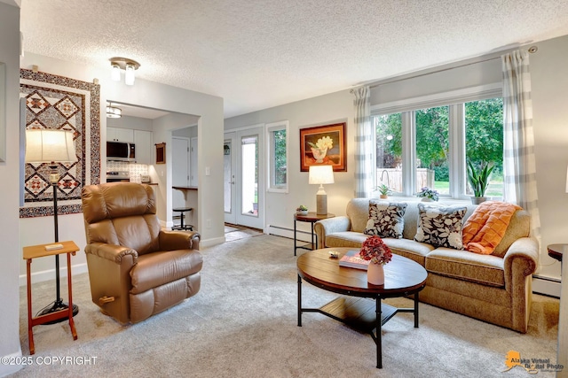 4840 Bryn Mawr Ct Unit 3, Anchorage, AK 99508 - living room with a baseboard radiator, a textured ceiling, and light colored carpet
