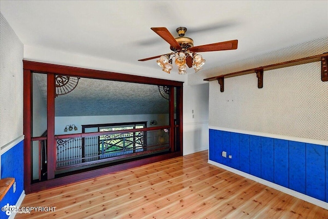 43725 Ross Dr, Soldotna, AK 99669 - spare room with ceiling fan and wood finished floors