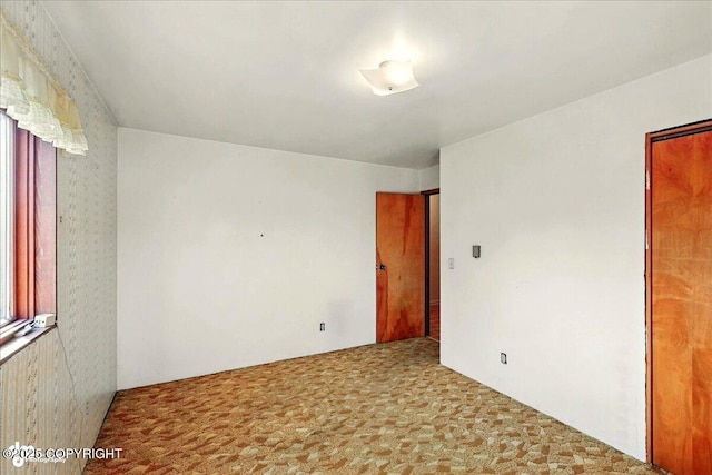 43725 Ross Dr, Soldotna, AK 99669 - unfurnished room featuring carpet floors