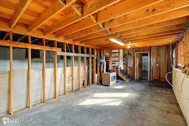 43725 Ross Dr, Soldotna, AK 99669 - unfinished below grade area with stairs and electric panel