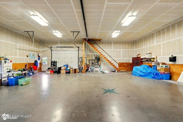 43725 Ross Dr, Soldotna, AK 99669 - garage featuring freestanding refrigerator