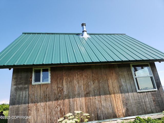44931 Fox View Dr, Homer, AK 99603 - view of home's exterior featuring a metal roof