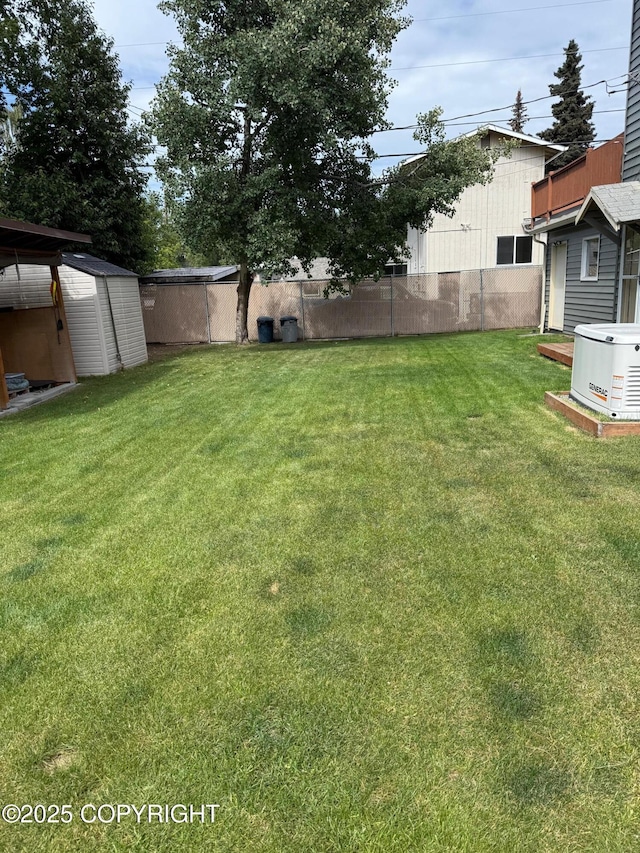 2090 Dimond Dr, Anchorage, AK 99507 - view of yard featuring a storage shed