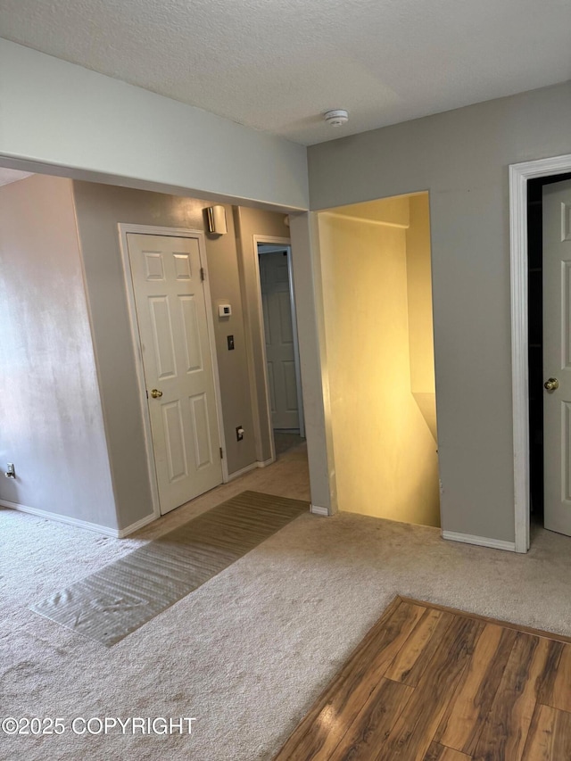 2090 Dimond Dr, Anchorage, AK 99507 - unfurnished bedroom featuring carpet floors and a textured ceiling