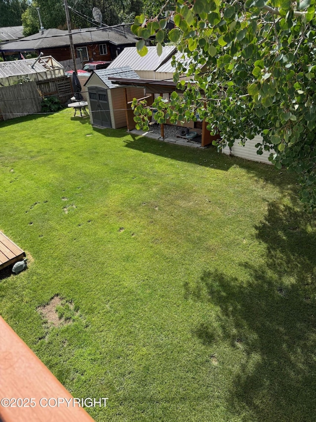 2090 Dimond Dr, Anchorage, AK 99507 - view of yard with a storage shed