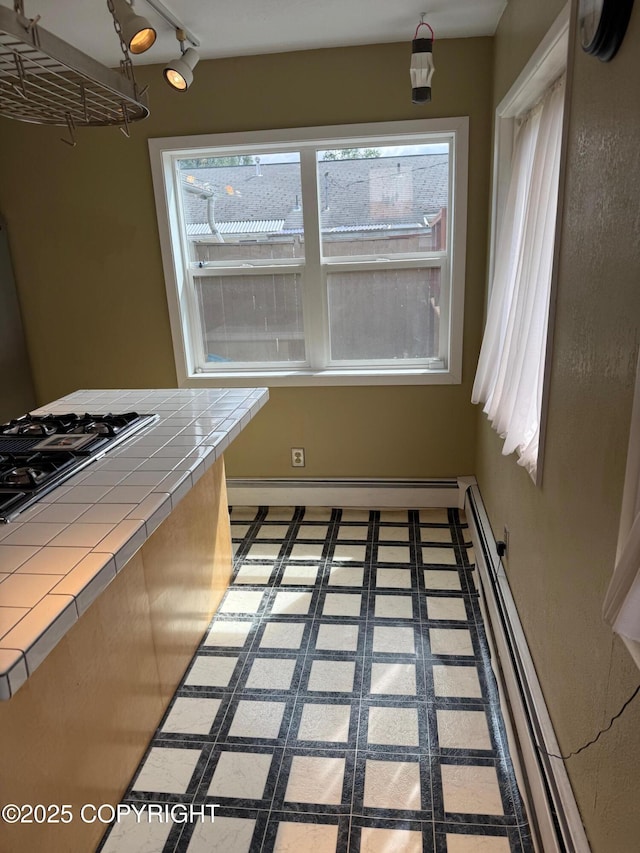 2090 Dimond Dr, Anchorage, AK 99507 - unfurnished dining area featuring a baseboard radiator