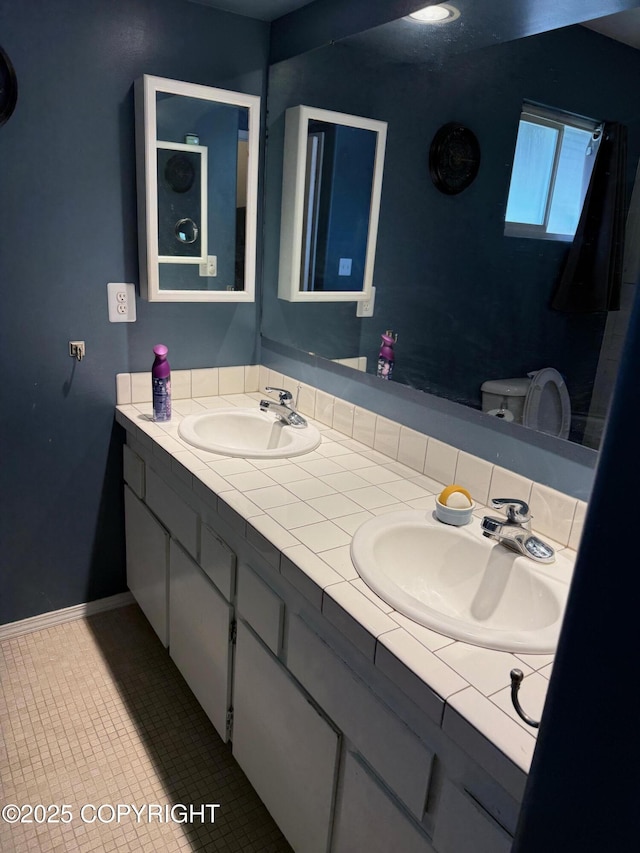 2090 Dimond Dr, Anchorage, AK 99507 - bathroom with double vanity and tile patterned flooring