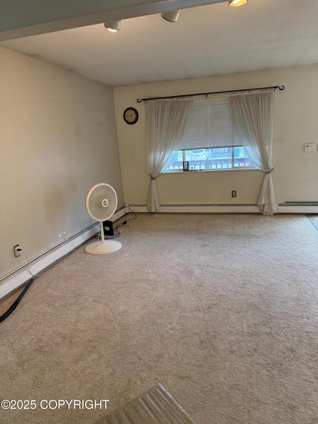 2090 Dimond Dr, Anchorage, AK 99507 - empty room featuring carpet and baseboard heating