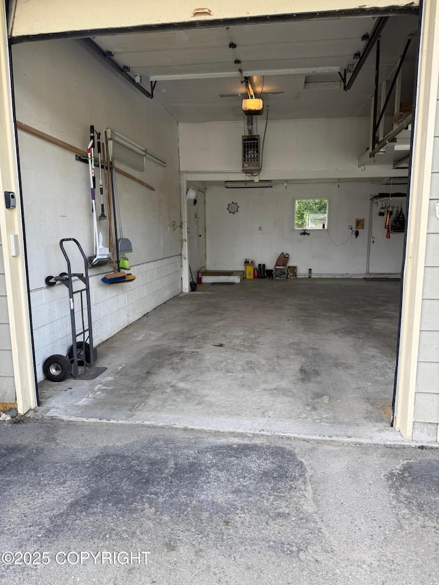 2090 Dimond Dr, Anchorage, AK 99507 - garage featuring a garage door opener