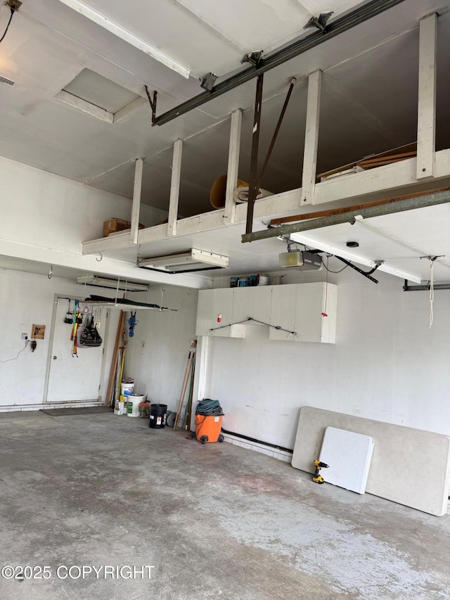 2090 Dimond Dr, Anchorage, AK 99507 - garage featuring a garage door opener